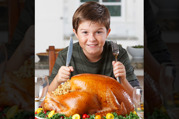 Boy enjoying Butterball turkey gift